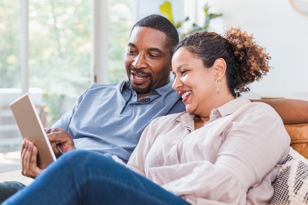Couple using a tablet